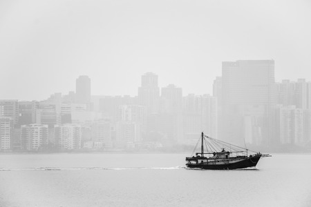 The boat was sailing in the sea of Macau cityの写真素材