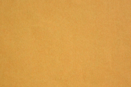 Closeup of yellow cardboard paper textureの写真素材