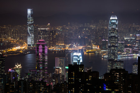 HONG KONG - January 23 : Scene of the Victoria Harbour from Victoria peak on January 23, 2015 in Hong Kong. Victoria Harbour is the famous attraction place for tourist to visit.のeditorial素材