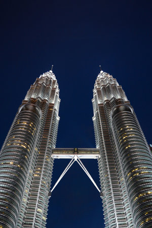 KUALA LUMPUR, MALAYSIA - MAY 24: Petronas Twin Towers at night on May 24, 2014 in Kuala Lumpur. Petronas Twin Towers were the tallest buildings (452 m) in the world from 1998 to 2004のeditorial素材