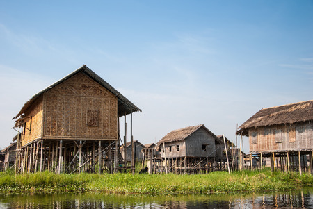 INLE LAKE, MYANMAR - APRIL 10: Floating houses in a village on APRIL 10, 2012 in Inle Lake, Myanmar. Inle lake is a famous lake for tourism in Myanmar.の写真素材