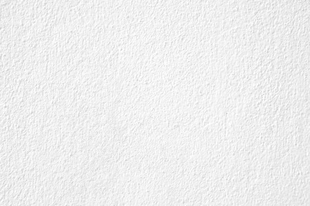 closeup of white plaster wall texture backgroundの写真素材
