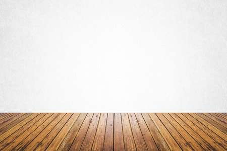 Empty room of white cement plaster wall and wood floorの写真素材