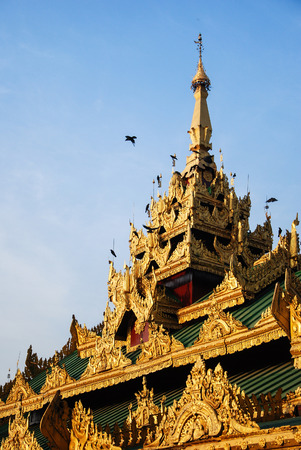 Roof of building around Shwedagon Pagoda. This detail is Burmese architecture style.の写真素材
