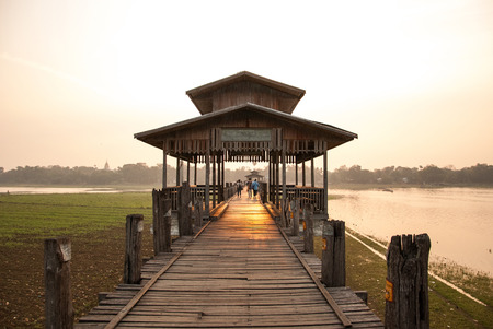 Ubein Bridge the longest wooden bridge in the world at sunrise Mandalay Myanmarの写真素材