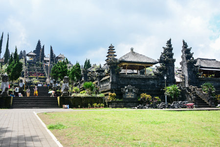 BALI INDONESIA  JANUARY 17 2013: Tourists visit Besakih Temple the largest and most important Hindu temple on Bali Island Indonesia.のeditorial素材