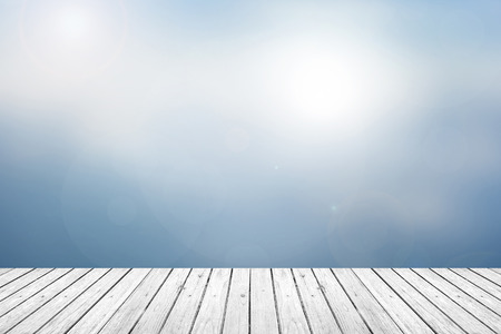 Gray Grey wooden floor with abstract blurred background in sky blue tone color. use for backdrop or web designの写真素材