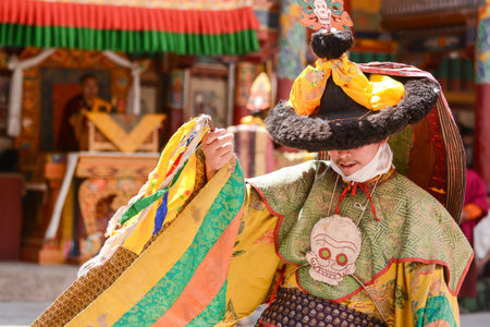 LEH, INDIA - JULY 7, 2014 : Hemis Festival in the Hemis monastery is the Masked Dance, performed by...