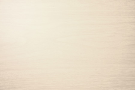 closeup detail of abstract beige wood texture background with light on top leftの写真素材