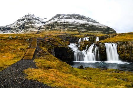 Beautiful waterfall landscape near Kirkjufell mountain in the Snaefellsnes Peninsula, natural landmark of West Icelandの写真素材