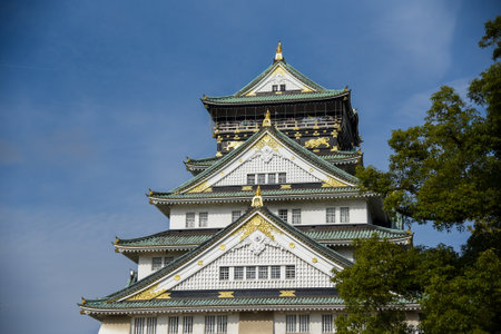 Osaka castle with clear blue sky and tree, This building is a famous landmark in Osaka, Japanのeditorial素材