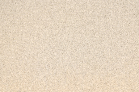 rough surface detail of beige plaster wall texture background, use for backdrop or design elementの写真素材