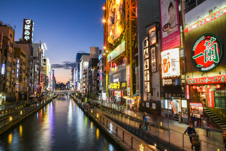 OSAKA, JAPAN - NOVEMBER 20, 2015 : Dotonbori Canal in Namba District at night, the famous entertainment area in Osaka, Japan.のeditorial素材