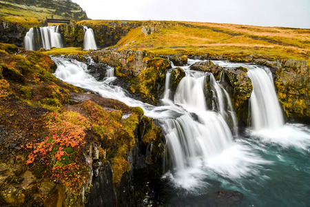 Beautiful waterfall landscape near Kirkjufell mountain in the Snaefellsnes Peninsula, natural landmark of West Icelandの写真素材