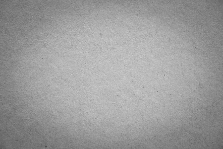 closeup surface detail of old gray (grey) paper texture background, use for backdrop or design element in education or business conceptの写真素材