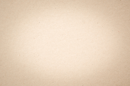 closeup surface detail of old beige-brown recycled paper texture background, use for backdrop or design element in education or business conceptの写真素材