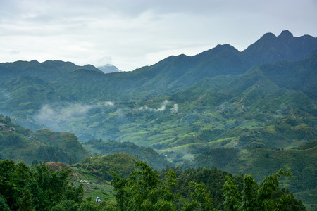 Beautiful Fansipan mountain landscape and rice field terraced in rainy season of Sapa, Lao Cai, Vietnamの写真素材