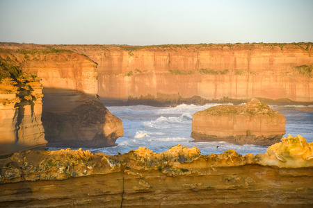 High cliff near Great Ocean Road and the Twelve Apostles, natural landmark and tourist attraction of Victoria, Australiaの写真素材