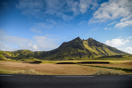 beautiful scenic mountain landscape near the Ring Road in summer of Icelandの写真素材