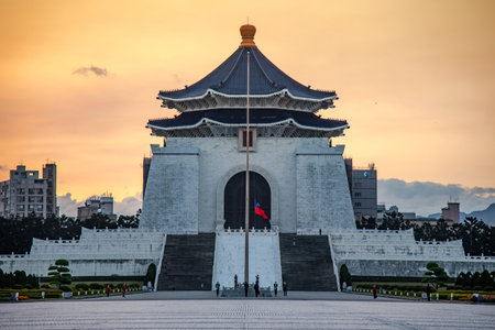 TAIPEI, TAIWAN - FEBRUARY 15, 2017 : Soldier raise the flag in the morning at Chiang Kai-shek memorial hall, a famous monument, tourist attraction and landmark of Taipei, Taiwan.のeditorial素材
