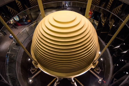 TAIPEI, TAIWAN - FEBRUARY 14, 2017 : Tuned mass damper of Taipei 101, a harmonic absorber mounted in structures to reduce the amplitude of mechanical vibrations, seen from 89th observatory floor.のeditorial素材