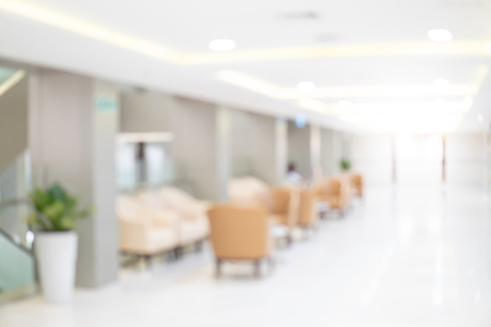 Abstract blur luxury hospital corridor. Blur clinic interior background with defocused effect. Healthcare and medical conceptの写真素材