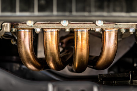 Car engine exhaust header. Automobile industryの写真素材