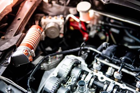 Internal design of car engine part in auto repair garage. Motor vehicle fixing and maintenance....