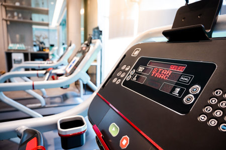 Group of treadmills in fitness club. Treadmill running in exercise gym. Physical sport concept