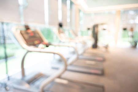 abstract blur exercise gym. Blurred fitness center. Defocused effect background or backdrop for sport conceptの写真素材