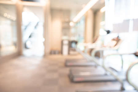 abstract blur exercise gym. Blurred fitness center. Defocused effect background or backdrop for sport conceptの写真素材