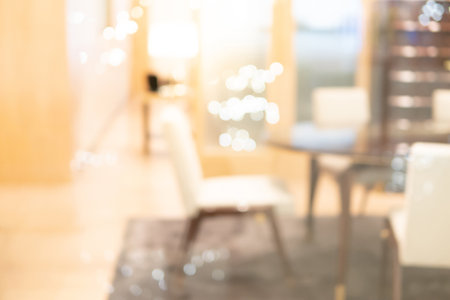 Abstract blurred restaurant background. Blurry cafe or coffee shop with dining tables, chairs and other decorations. Blur backdrop for design element. Food and beverage concept.の写真素材