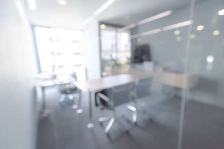 Abstract blurred office hall interior room. Blurry corridor in working space with defocused effect. Use for background or backdrop in business conceptの写真素材