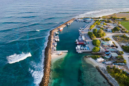 Aerial view of boat jetty at Fuvahmulah Harbour, fishing port and famous dive site for tiger sharks, Fuvahmulah Island, Gnaviyani Atoll or Nyaviyani Atoll, Maldivesの写真素材