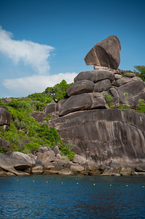 Beautiful scenery of Sailboat Rock and coastline in sunny day at Similan island number 8, Similan National Park, Phang-nga Province, Thailand.の写真素材