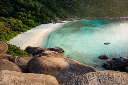 Beautiful white sand beach at Donald Duck Bay or Ao Kuerk Bay during sunset, view from Sailboat rock viewpoint at Similan island number 8, Similan National Park, Phang-nga Province, Thailand.の写真素材