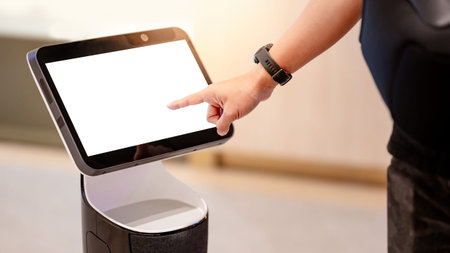 Robo-advisor concept. Male hand touching on interactive digital screen of navigation robot in...