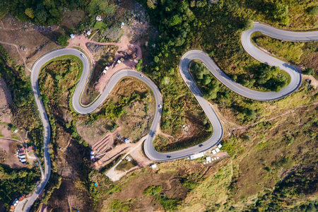 Aerial view of curvy road and winding path on the mountain up to Phu Tub Berk in Phetchabun province, Thailand.の写真素材