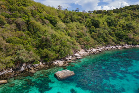 Aerial view of Racha Noi Island or Koh Racha Noi, a beautiful tropical island in Andaman sea with turquoise clear water along the shore. A popular destination for summer vacation in Phuket, Thailand.の写真素材
