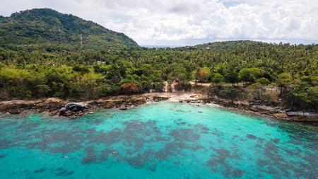 Aerial view of Racha Yai Island or Koh Raya, a beautiful tropical island in Andaman sea with turquoise clear water along the shore. A popular destination for summer vacation in Phuket, Thailand.の写真素材