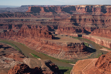 Colorado river view from Dead Horse Point overlook. Dramatic canyon landscape, eroded rugged scenery...