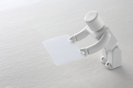 AI robots exchanging business cards in the business field of the future societyの写真素材