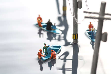 A diorama rescue operation in a flooded city and lifeboatの写真素材