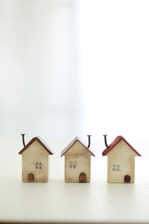 Group photo of a model of a house made of miniature woodの写真素材