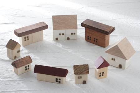 Group photo of a model of a house made of miniature woodの写真素材
