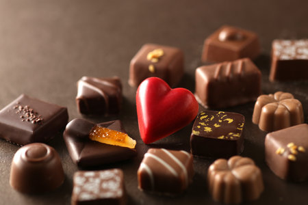 Group photo of chocolates with red heart-shaped chocolatesの写真素材