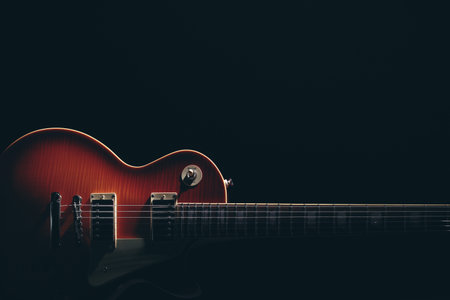 Electric guitar on black backgroundの写真素材