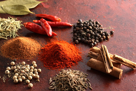 Various spices and spices shot on warm background