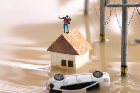 Diorama of flood damage and rescue people and rescue teamsの写真素材