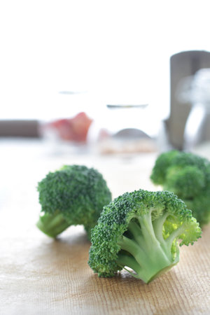 Broccoli in the kitchen prepared for cookingの写真素材